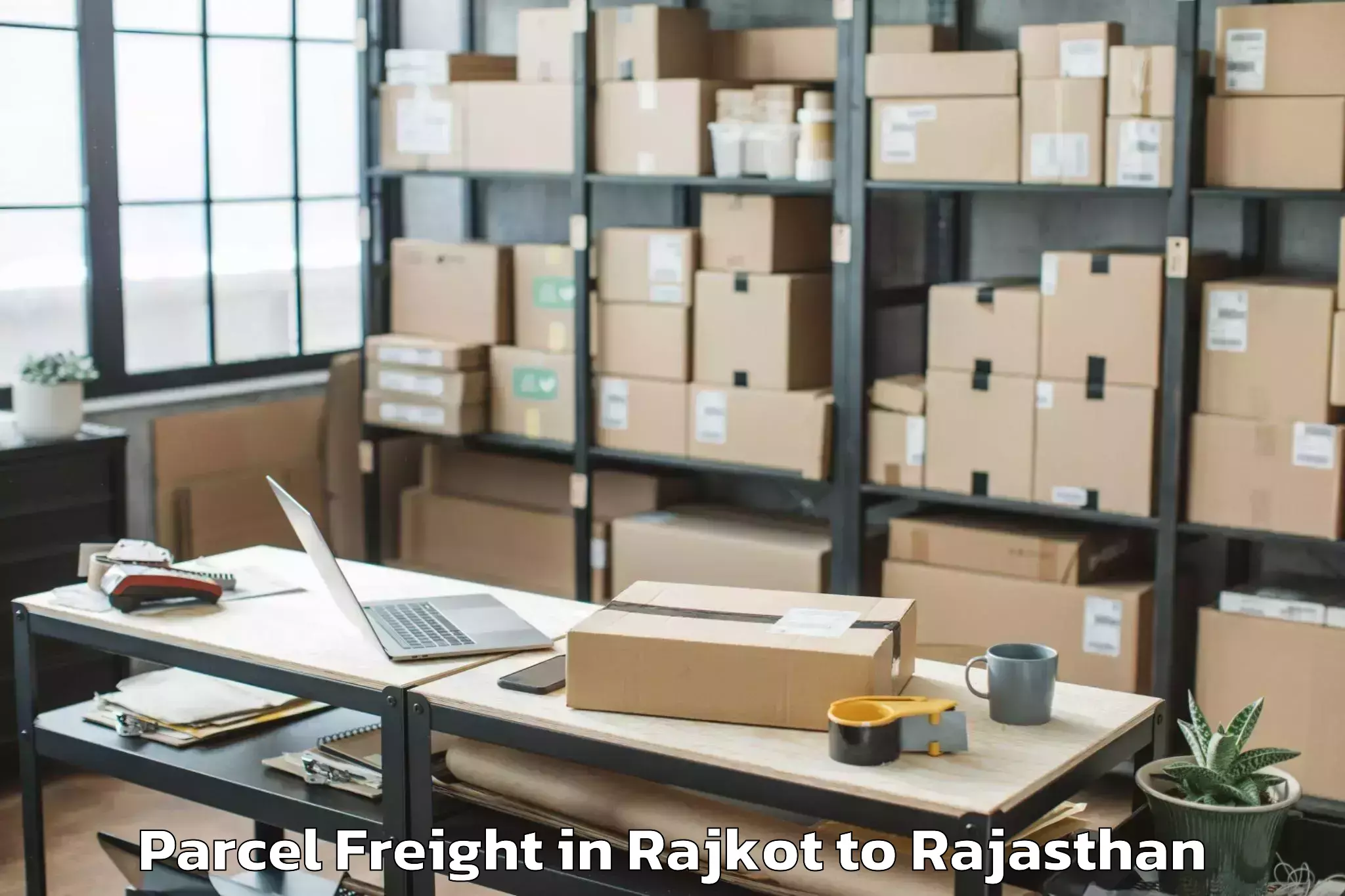 Book Rajkot to Ladnu Parcel Freight Online